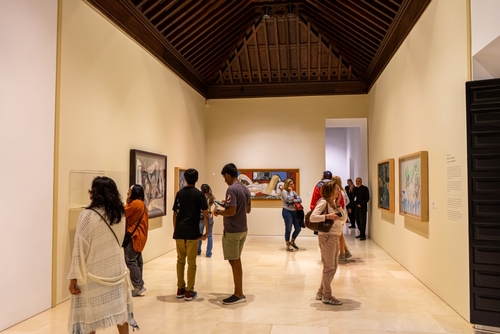People visiting Picasso museum on evening of free culture in Malaga, Andalusia, Spain