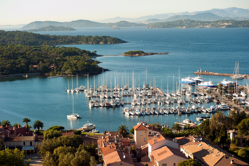 Scenic view of Porquerolles Port and National Park near Saint Tropez in the French Riviera, Cote d'Azur, France
