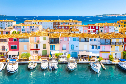 View of colorful houses and boats in Port Grimaud near Saint Tropez in the French Riviera, Cote d'Azur, France