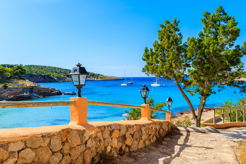 Beautiful view of a path to beach in Cala Portinatx bay, Ibiza island, Balearic Islands, Spain