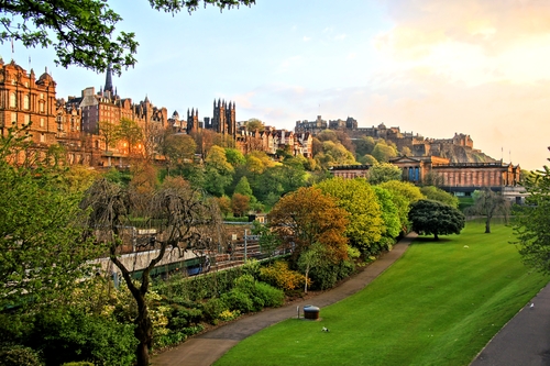 View of old Edinburgh, Scotland at sunset from Princes Street Gardens, Scotland, UK
