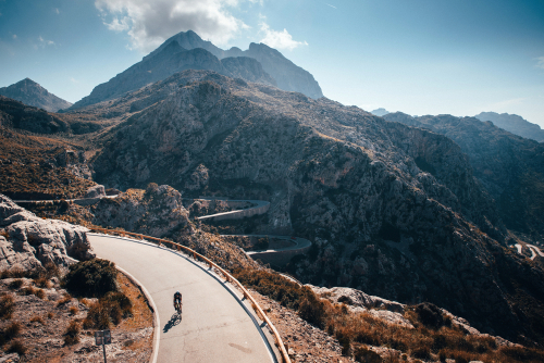 Cyclist on the famous Sa Calobra Serpentine Road on Mallorca island, Balearic Islands, Spain