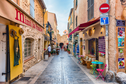 Walking in the streets of Saint-Tropez, Cote d'Azur, France. The town is worldwide famous resort for the European and American jet set and tourists
