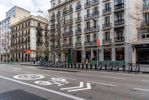 Scenic view of Serrano Street with fashion retail storefronts. Salamanca District is well known for being one of the wealthiest areas with a high living cost and luxury, Madrid, Spain