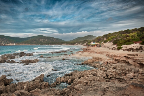 View of a rocky beach at the Ses Salines Natural Park on Ibiza Island, Balearic Islands, Spain