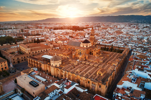 The Mosque–Cathedral of Córdoba aerial closeup view at Sunset in Andalusia, Spain