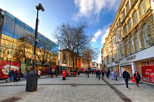 View of Queen Street, one of the main shopping street in the city center, Cardiff, Wales, UK