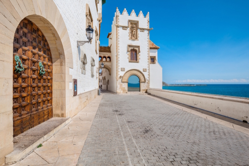 Beautiful street view and view of the seafront in the town of Sitges, Catalonia, Spain