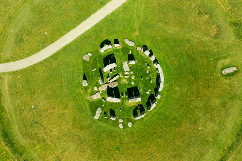 Aerial view of Stonehendge on a Sunny day in Summer with no people around. This is a historic site with a ring of standing stones, it was believed to be a burial site, located west of Amesbury in England, UK