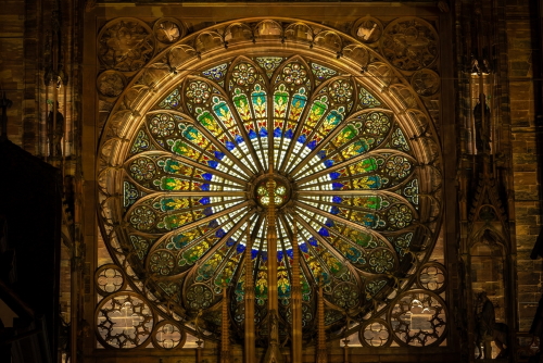 Interior view of the Strasbourg's Cathedral rose window at night in Strasbourg, Alsace, France