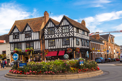 Roundabout and Half-timbered house in Stratford-upon-Avon, Warwickshire, England, United Kingdom