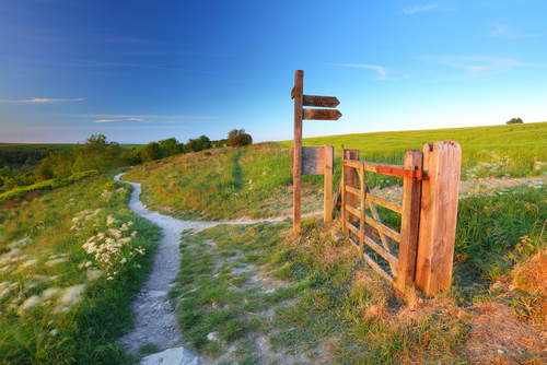 Wooden Sign and Gateway on a Bridleway on the Cleveland Way near Sutton Bank, North Yorkshire Moors National Park, England, UK