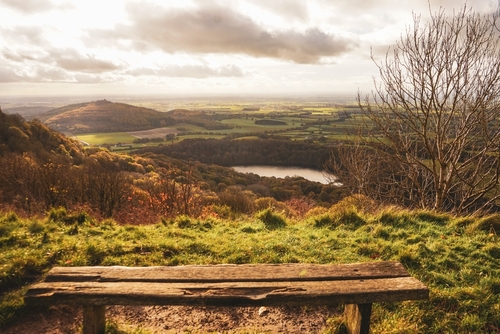 Bench atop Sutton Bank, overlooking Lake Gormire on a winter’s morning, North Yorkshire Moors National Park, England, United Kingdom