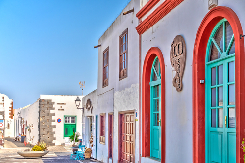 Colorful view of houses on a street in the city of Teguise, Lanzarote Island, The Canary Islands, Spain