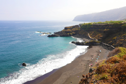 Playa de el Bollullo black volcanic sand beach in Tenerife island, The Canary Islands, Spain