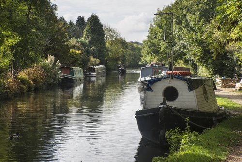 Canal barges on Grand Union Canal at Rickmansworth in Colne Valley Regional Park near London, England, UK