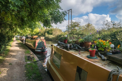 Canal barges on Grand Union Canal at Rickmansworth in Colne Valley Regional Park near London, England, UK