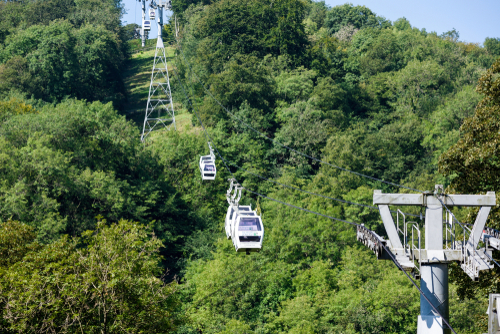 Three of the twelve cable cars travelling towards the Heights of Abraham in the Peak District National Park, Derbyshire, England, United Kingdom