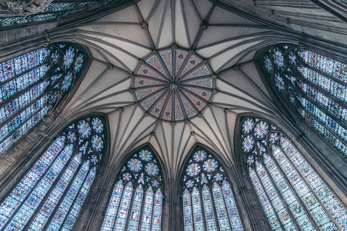 Beautiful empty interior of the York Minster Iconic Gothic style medieval cathedral with stained-glass windows in Yorkshire, England, UK