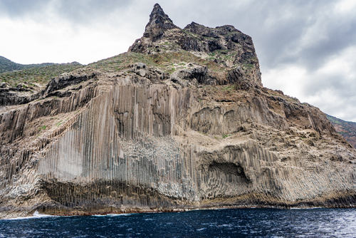 View from the sea of the volcanic rock formation, Los Organos, La Gomera island, The Canaries, Spain