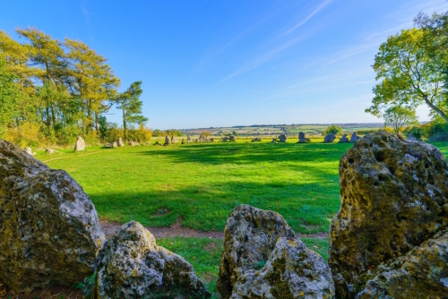 View of the ancient Rollright Stones, Neolithic stone circle, in the Cotswolds region, England, UK
