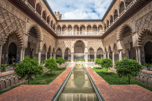 Patio at the courtyard of the Royal Alcazar of Seville, Andalusia, Spain