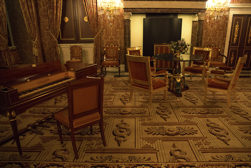 Detail of a room in the Royal Palace of Amsterdam furnished with furniture, sits and tables of great prestige. All the furniture is very expensive and ancient. Amsterdam, The Netherlands