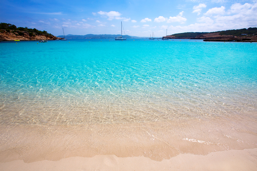 View of the Cala Bassa beach with white sands and turquoise waters, Ibiza island, Balearic Islands, Spain