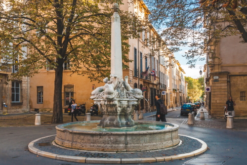 Fountain of Four Dolphins or Fontaine des Quatre-Dauphins, symbol of the Mazarin Quarter, was built in 1667 and was originally called Fontaine Saint-Michel, Aix en Provence, Provence, France