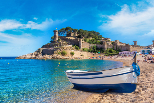 Beach at Tossa de Mar and fortress in a beautiful summer day, Costa Brava, Catalonia, Spain