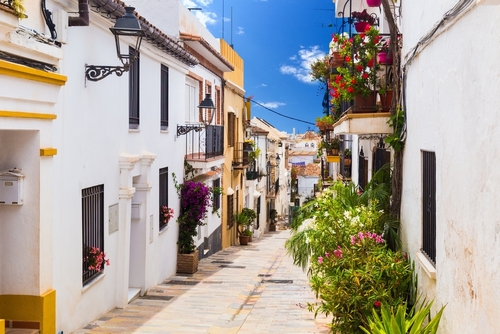 A picturesque narrow street in Marbella old town, near Malaga, Costa del Sol, Andalusia, Spain