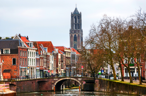 View of old town with Dom Tower in Utrecht, The Netherlands, on a cloudy day