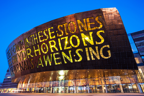 Wales Millennium Centre highlighted at night, Cardiff Bay, Cardiff, Wales, United Kingdom