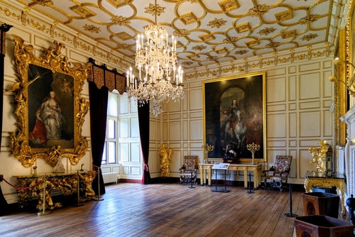 Interior view of the decorative State Dining Room at Warwick Castle, Warwickshire, England, United Kingdom