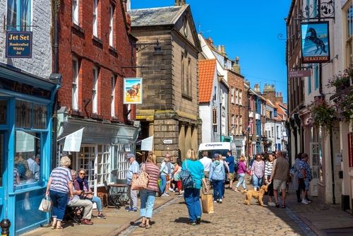 Typical tourist street in Whitby, North York Moors National Park, Yorkshire, England, UK