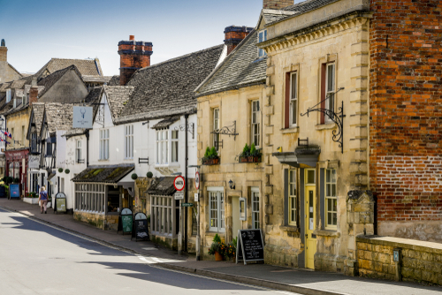 A street scene in the historic town of Winchcombe in the Cotswolds, Gloucestershire, England, UK