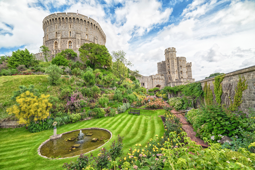 Summer view of the castle gardens in Medieval Windsor Castle. Windsor Castle is a royal residence at Windsor in the English county of Berkshire near London, England, UK