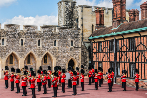 Changing Guard Ceremony takes place in Windsor Castle in the English county of Berkshire near London, England, United Kingdom. British Guards in red uniforms are among the most famous in the world