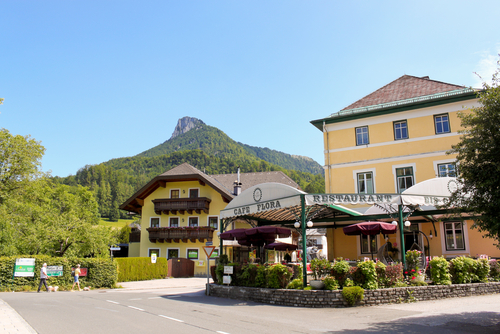 A street and an outdoor restaurant in the small alpine town Fuschl am See, near Salzburg, Austria