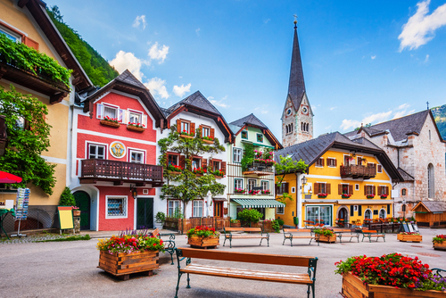 Beautiful view of colorful houses in the main square of the mountain village Hallstatte, Salzkammergut, Austria