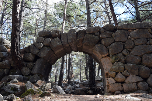 Ruins of an antique arch in the forest, Kadyanda, Yeşilüzümlü, Fethiye, Anyalya, Turkey