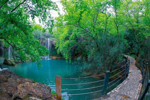 Beautiful waterfalls over emerald water in deep green forest in Kursunlu Natural Park, Antalya, Turkey