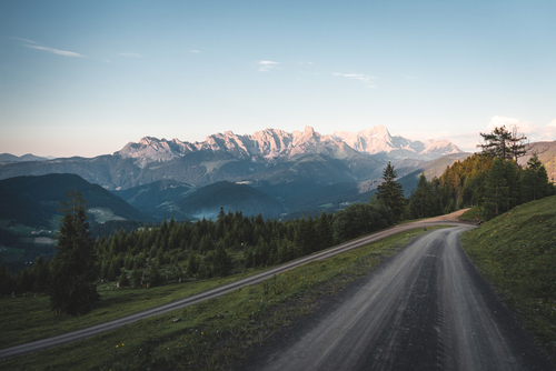 Alpine mountain gravel road way hiking trail path at Rossfeld Panoramastrasse, Berchtesgaden, Bavaria, Germany