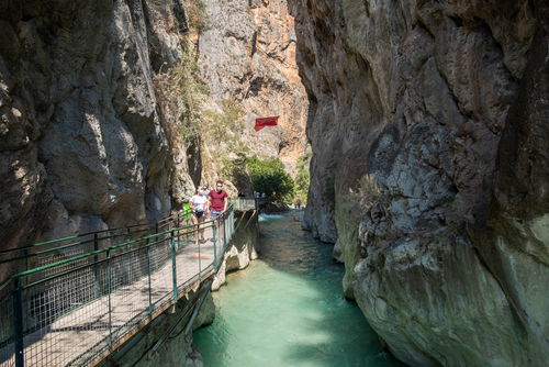 Tourists are walking in a canyon in Saklikent near Kemer, Antalya, Turkey