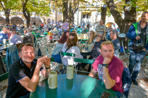 Austria's biggest beer tavern Augustiner brau, Kloster Mulln, Salzburg, Austria. Lush garden or cosy terrace area, inside of quaint halls or snug lounge areas