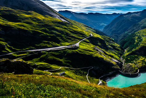 Pasterze glacier lake with hydropower dam in national park Hohe Tauern with Großglockner high alpine road in Austria