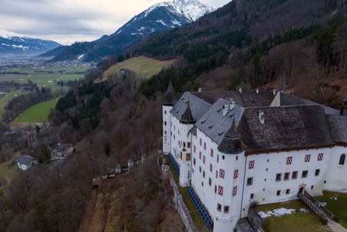 Tratzberg Castle in Tyrol, Austria. Aerial view at Winter twilights, White Renaissance Castle
