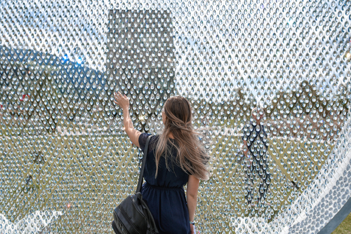 People viewing a crystal exhibit at the Swarovski Crystal World complex in the Wattens, Tirol, Austria