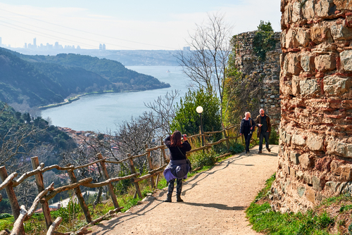 Tourists at Yoros Kalesi (Castle) in the Anadolu Kavagi village at the Bosphorus Anatolian Side, near Istanbul, Turkey