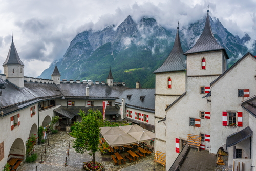 View of the main courtyard of the hohenwerfen castle in Austria with a mountainous background